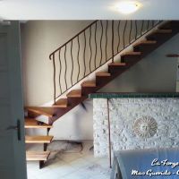 escalier double limon marches bois ramabarde effet tordu fer Forge Catalane Cabestany