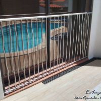 Protection piscine barreaux effets tordus forge catalane 2