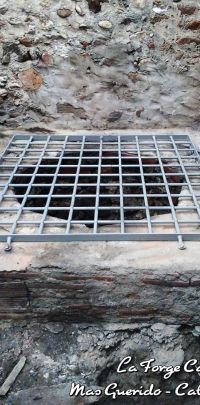 grille en couverture puit forge catalane