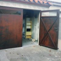 porte de garage tole double vantaux finition rouillee forge catalane